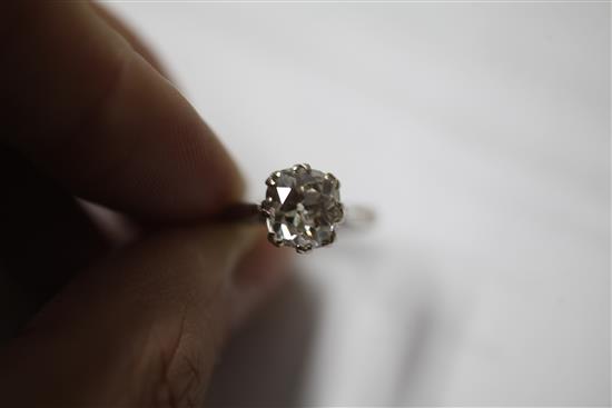 A platinum and solitaire old cushion cut diamond ring, size O.